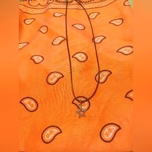 Black cord necklace with star charm